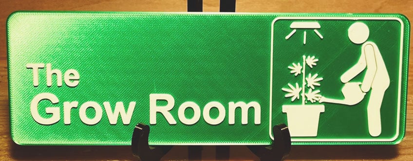 Luminous Grow Room Light Ein grünes Schild mit den Worten