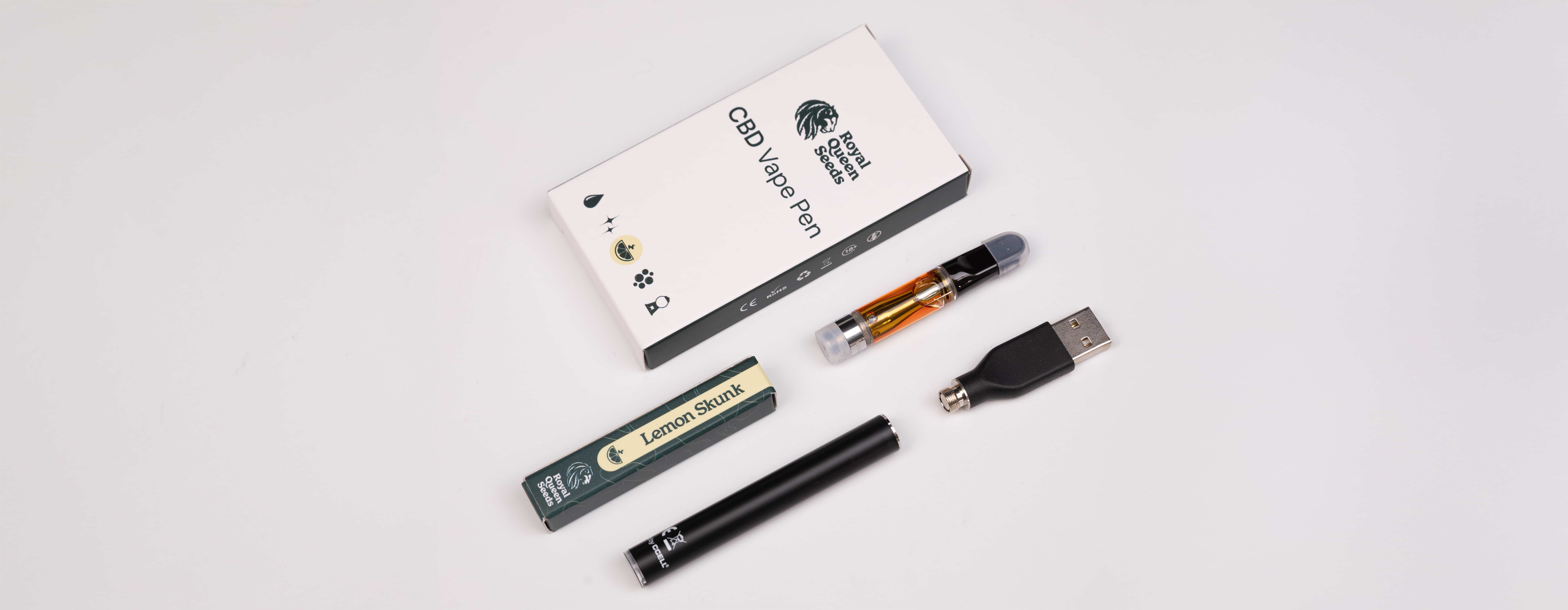Eine schwarze Schachtel mit einem weißen Etikett mit der Aufschriftvape kit und royal gorilla die schachtel ist offen enth lt einen vape-stift eine patrone ein usb-ladeger t