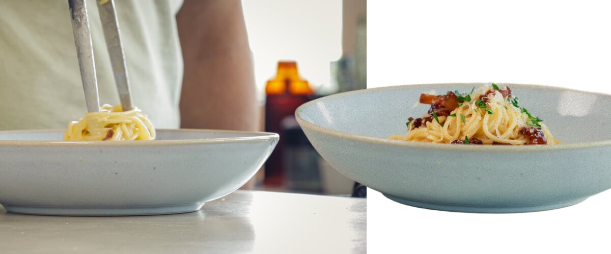 Cremige Cannabis-infundierte Spaghetti Carbonara mit Pancetta und geriebenem Käse anrichten, letzter Schritt vor dem Servieren